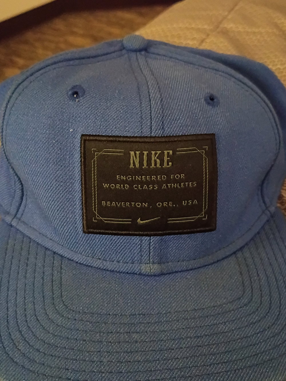 Nike Men’s Blue Snapback Hat with Black Patch